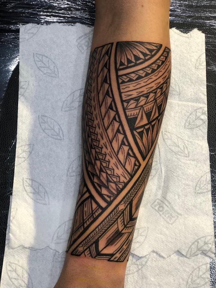Polynesian back tattoo by Andy