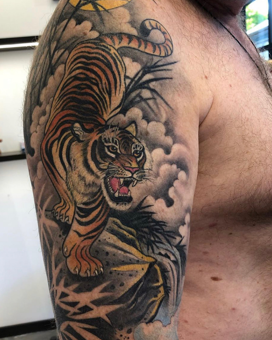 Neo traditional Japanese tiger tattoo on the arm done by @marky2dix |  www.otzi.app | Japanese tattoo, Tiger tattoo, Tattoos for guys